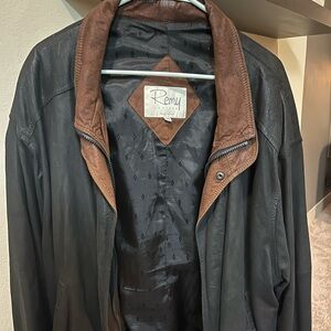 Remy Black Leather Jacket Size 44 with brown collar.